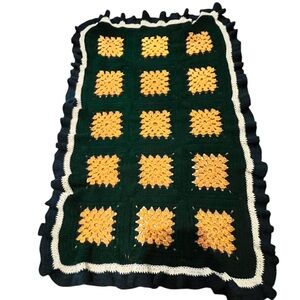 Vintage granny square afghan in green and gold